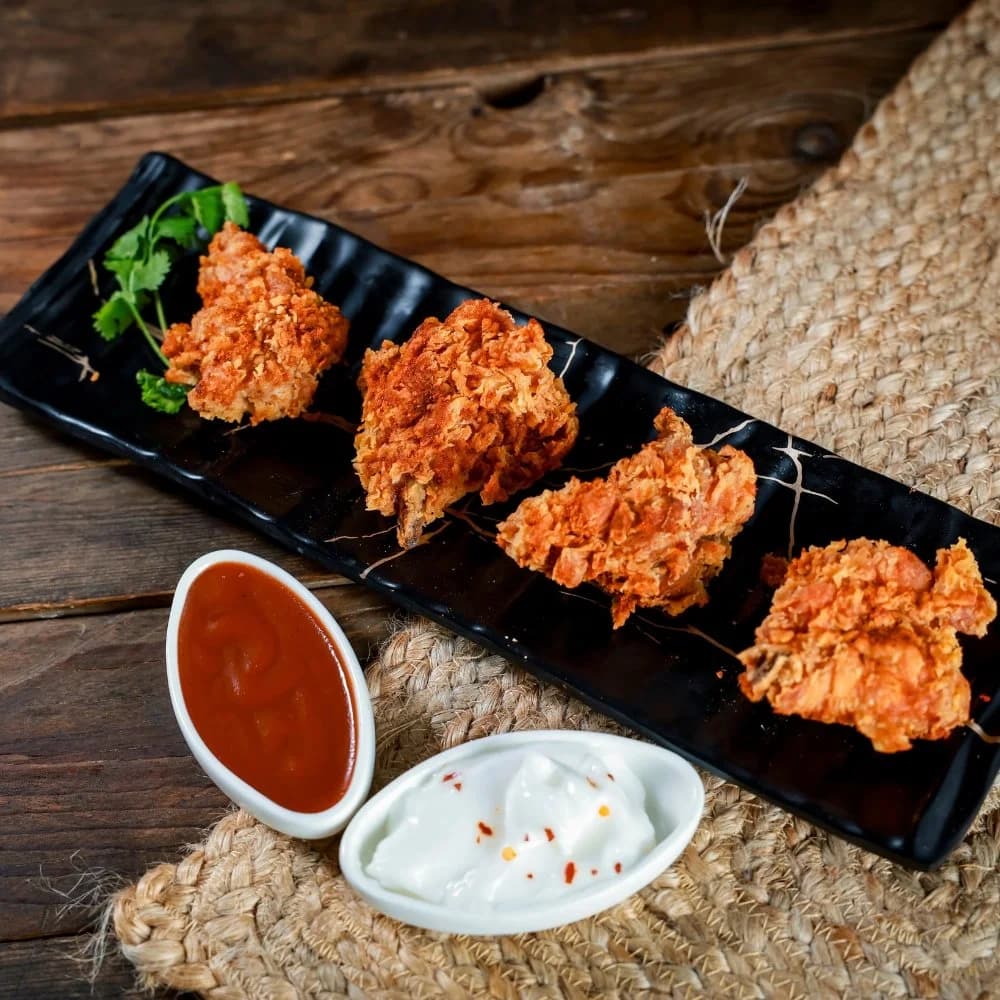 Crunchy fried chicken with ketchup and mayonnaise