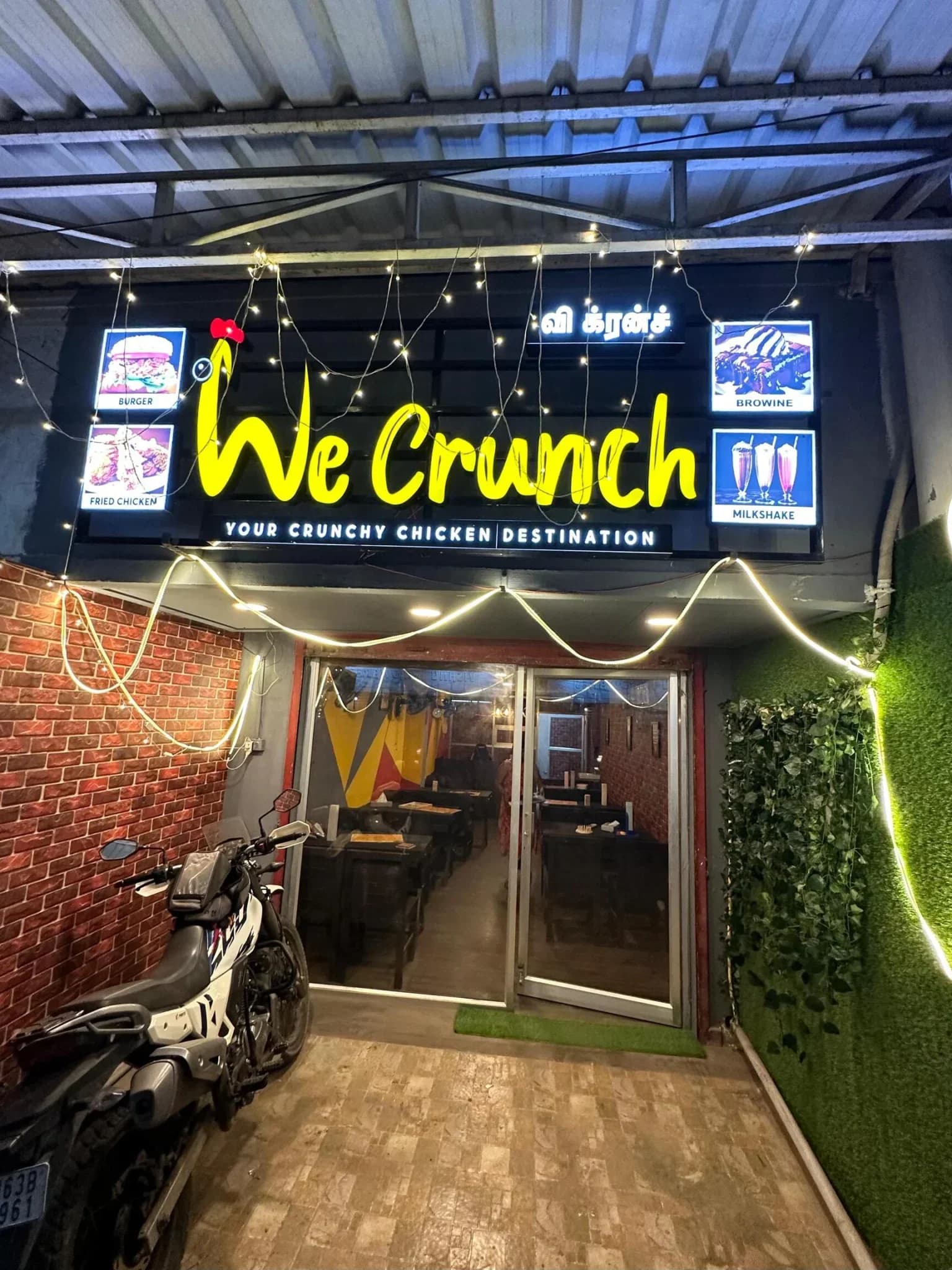 WeCrunch outlet entrance at night